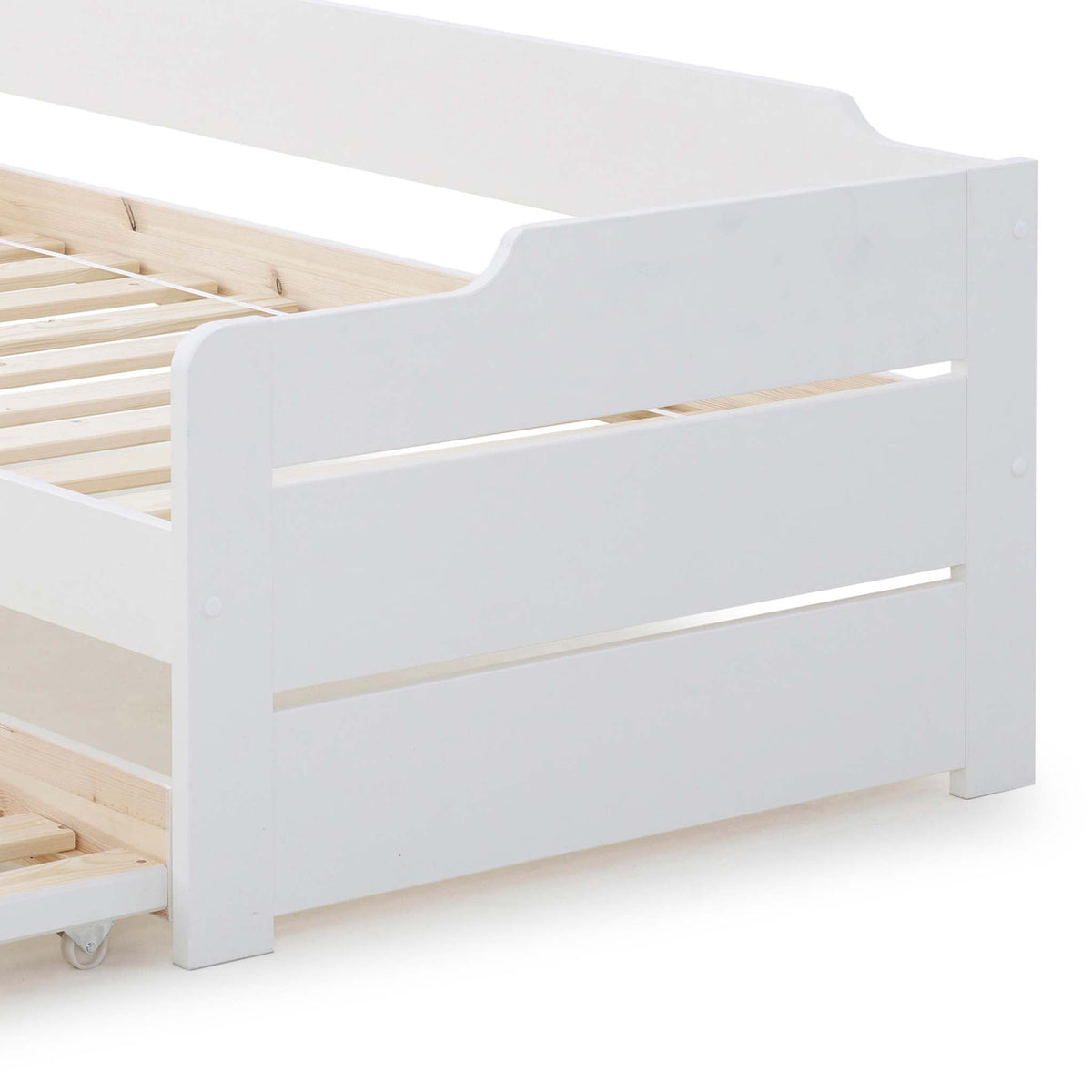 close up of the white painted wooden frame on the Snooze White Wooden Bed with Trundle 