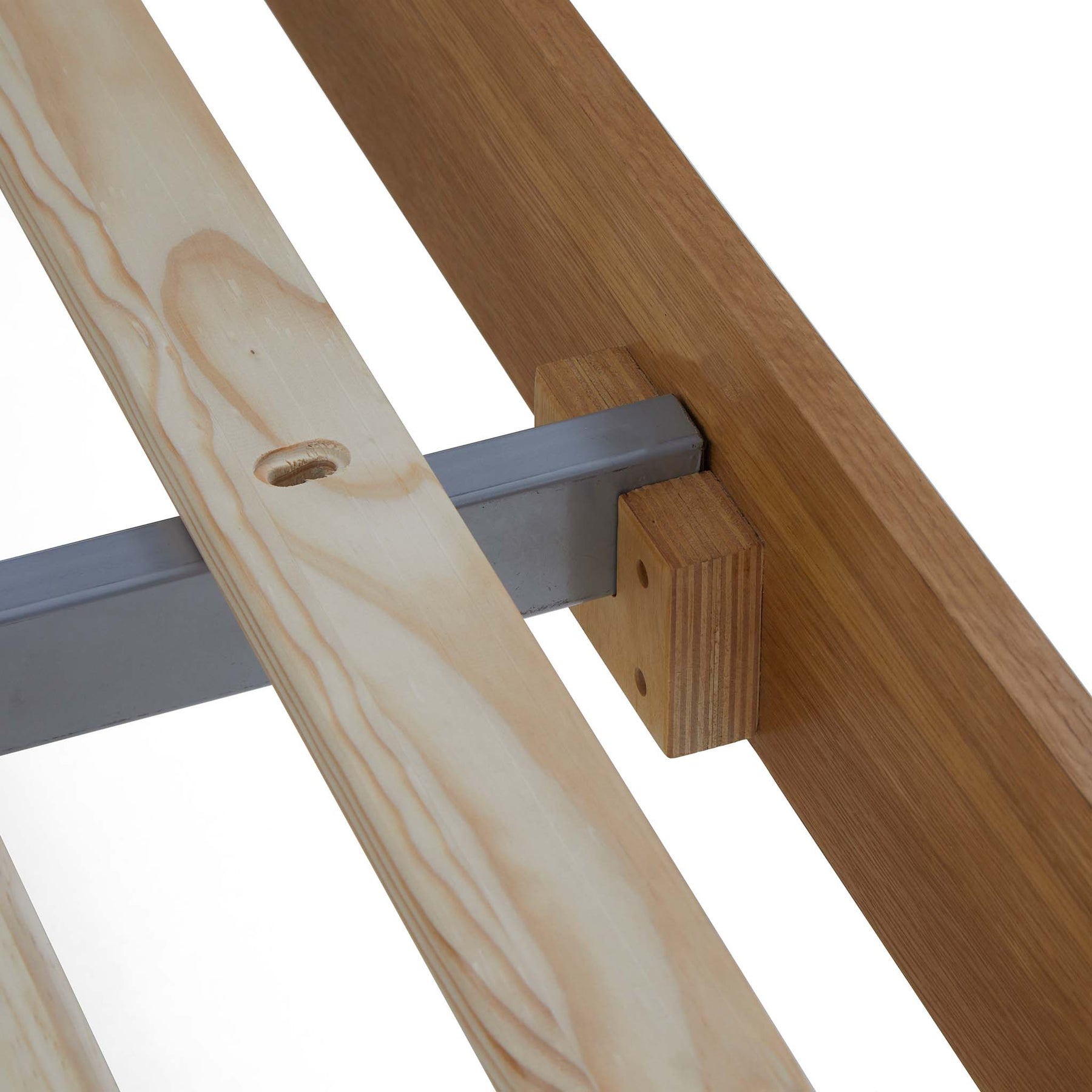 Two wooden boards intersect, one with a metal bracket attached, against a white background.