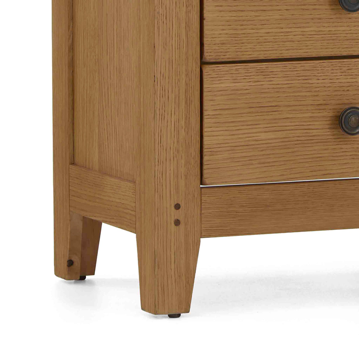 close up of tapered Scandi legs on the Broadway Oak Bedside Table