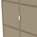 A beige wardrobe with a simple vertical handle, partially ajar revealing a sliver of light from within against a plain background.