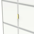 A white bookshelf with a golden knob, set against a plain background.