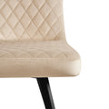A beige upholstered chair with diamond pattern stitching on a white background.