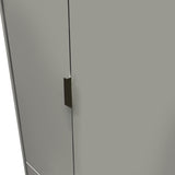A metallic handle on a grey surface, possibly a door, appears slightly ajar against a neutral background. No text is present.