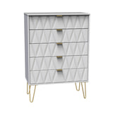A modern grey dresser with geometric patterned drawers and brass handles, standing on splayed golden legs, isolated against a white background.