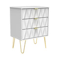 A modern grey chest of drawers with geometric patterns, gold handles, and splayed legs, standing isolated on a white background.
