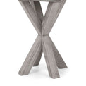 close up of the grey washed crossed wooden legs on the Epsom Round Side Table