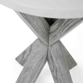 close up of the crossed legs on the Epsom Round Side Table