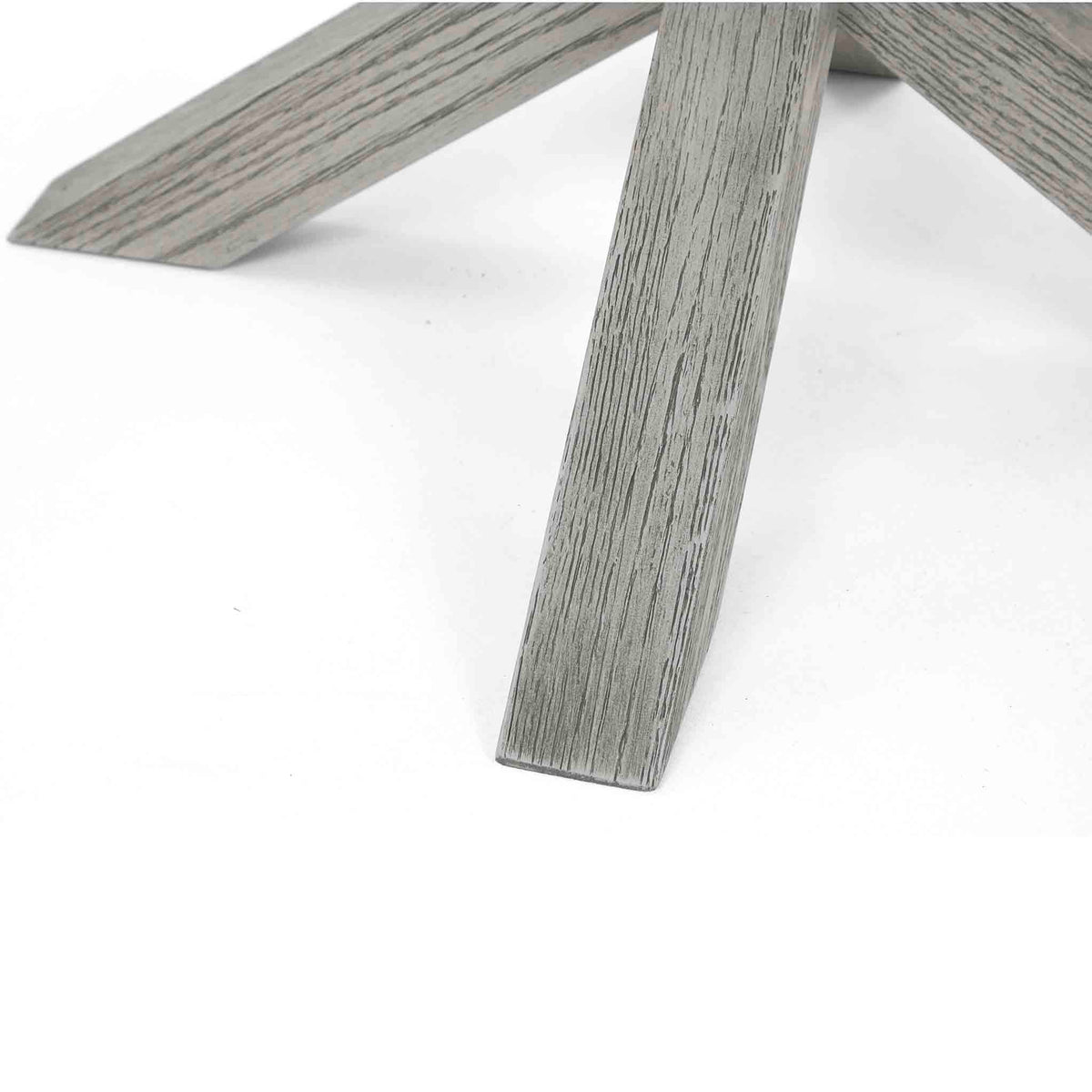 close of of the crossed solid wood legs on the Epsome Round Coffee Table
