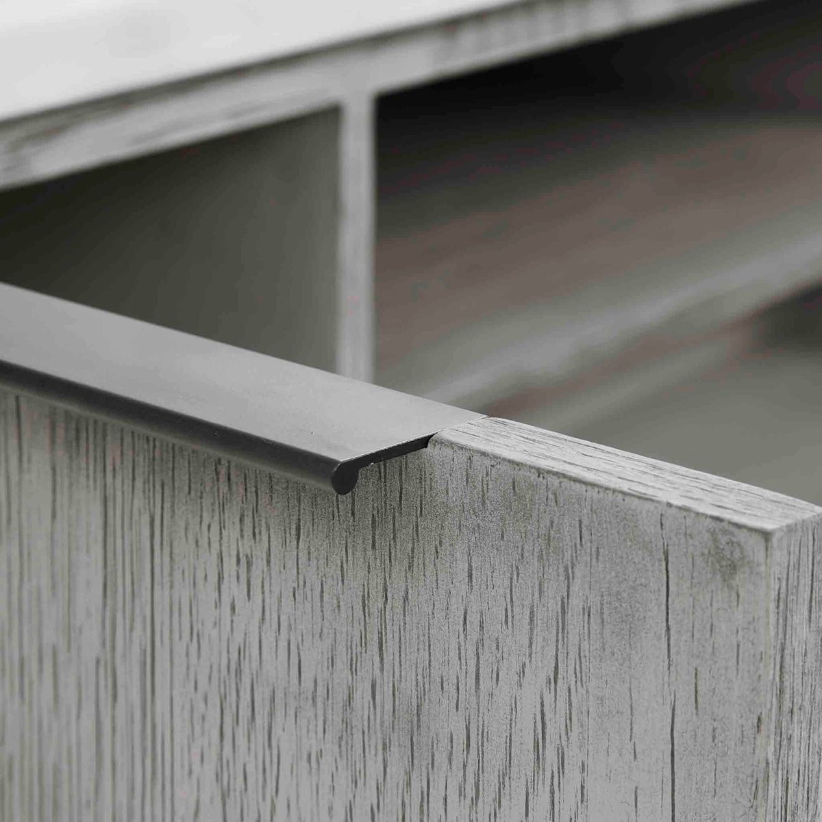 close up of the door handle on the Epsom 90cm Small TV Stand