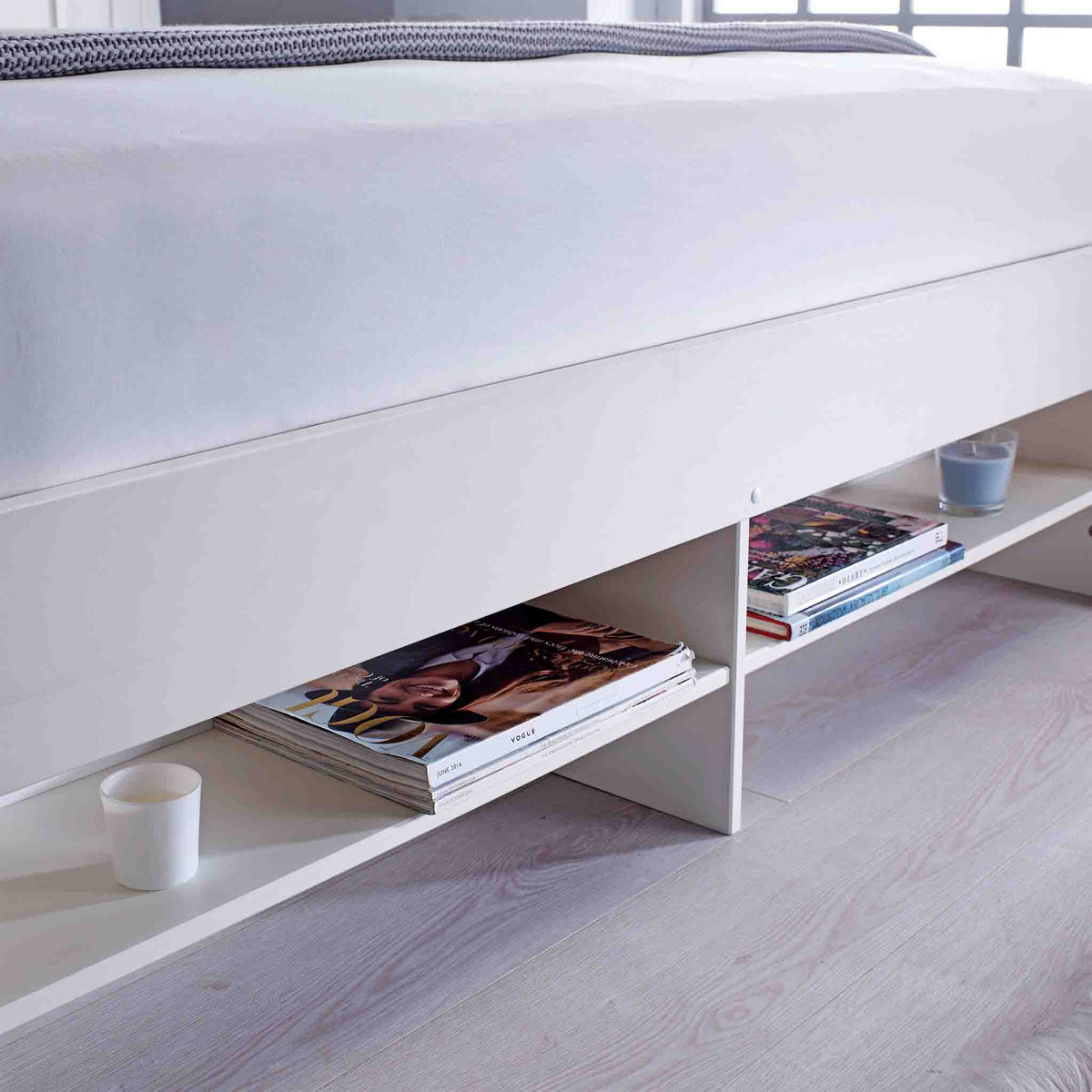 close up of the footend shelves on the Farndon White Storage Bed with Drawers