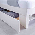 close up of the under bed drawer on the Farndon White Storage Bed