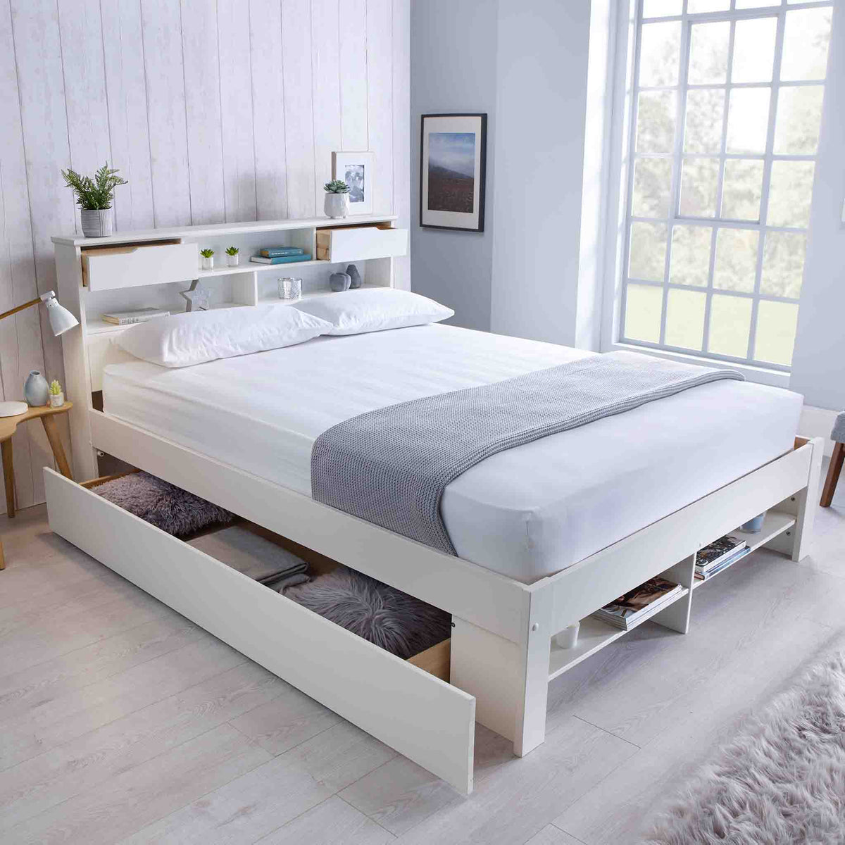 Lifestyle image with opened drawer of the Farndon White Storage Bed