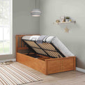 opened under bed storage view of the Atlas Oak Single Wooden Ottoman Bed