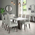 Lifestyle image of the Saltaire Grey Upholstered Fabric Dining Chair with large dining table