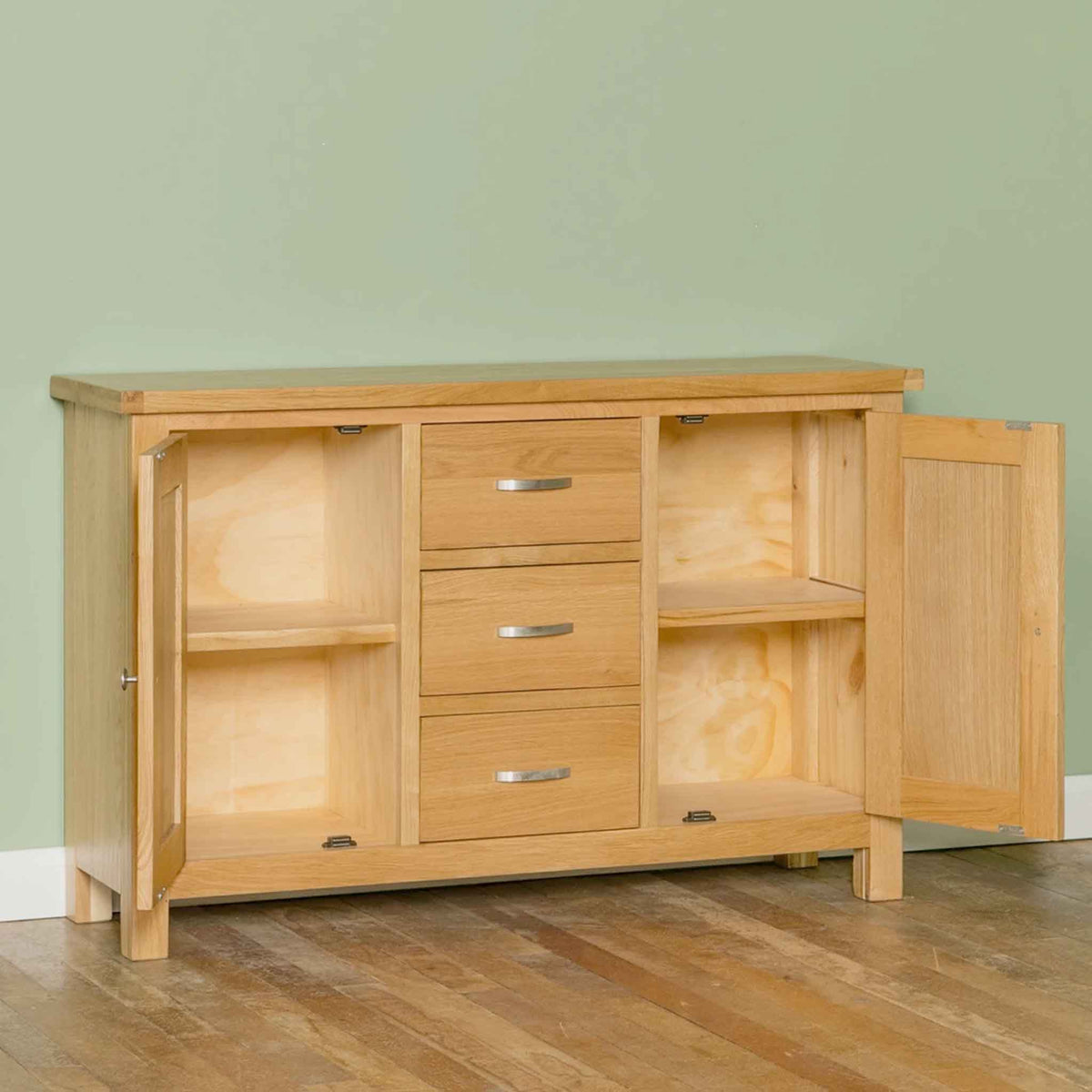 London Oak 3 Drawer Sideboard - Side view with cupboard doors open