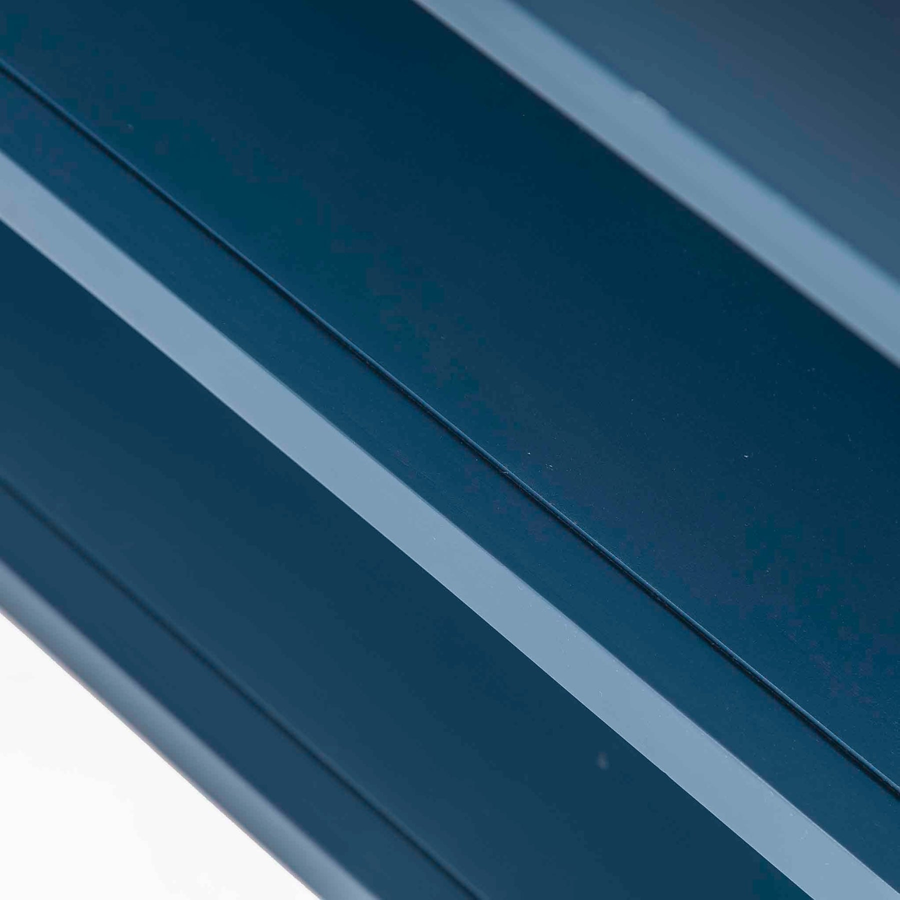 Stirling Blue Corner TV Stand - Close up of edge of shelves