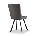 A modern charcoal-colored dining chair with a curved backrest and four black angled legs, isolated against a white background.