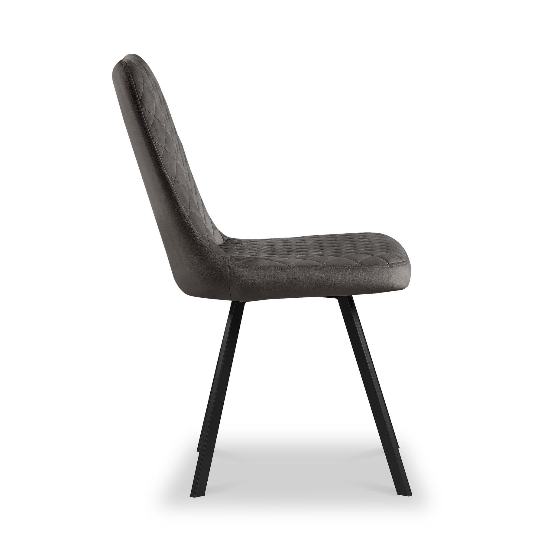 A modern dark chair with a quilted seat rests stationary against a white background.