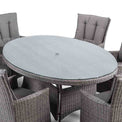 close up of the tempered glass top on the Cadiz Oval Grey Outdoor Rattan Dining Table