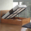 lifestyle image of the Trent Oak Wooden Ottoman Bed with raised under bed storage