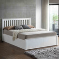lifestyle image of the Trent White Wooden Ottoman Bed