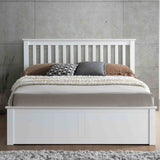 lifestyle front view image of the  Trent White Wooden Ottoman Bed 
