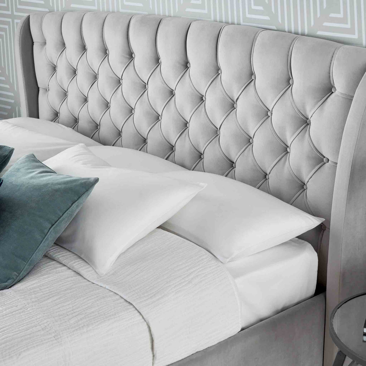 close up of the button tuft headboard on the Stafford Grey Velvet King Size Storage Bed
