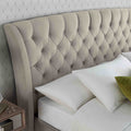 close up of the button tuft headboard on the Stafford Stone Velvet King Size Storage Bed