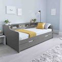 closed trundle lifestyle image for the Store and Sleep Grey Twin 3ft Bed Frame