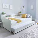 lifestyle image of the Store and Sleep White Twin 3ft Bed Frame with extending trundle
