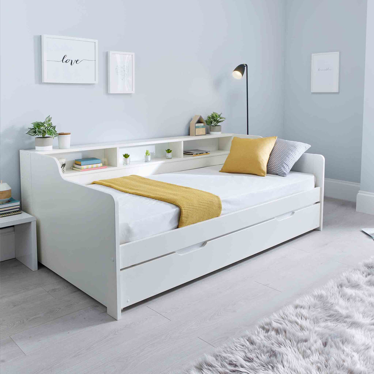 lifestyle image of the Store and Sleep White Twin 3ft Bed Frame with trundle 