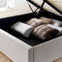 close up of the under bed storage on the Sutton Grey Upholstered Fabric Ottoman Storage Bed