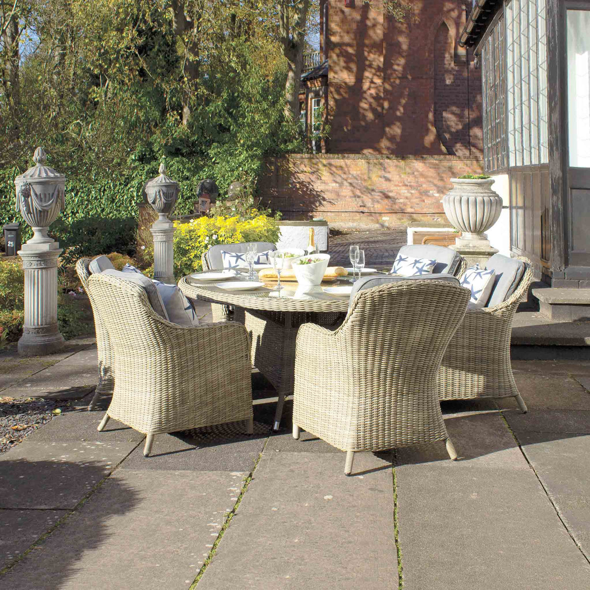 Wentworth 6 Seat 200cm Ellipse Deluxe Rattan Garden Dining Set Lifestyle Setting