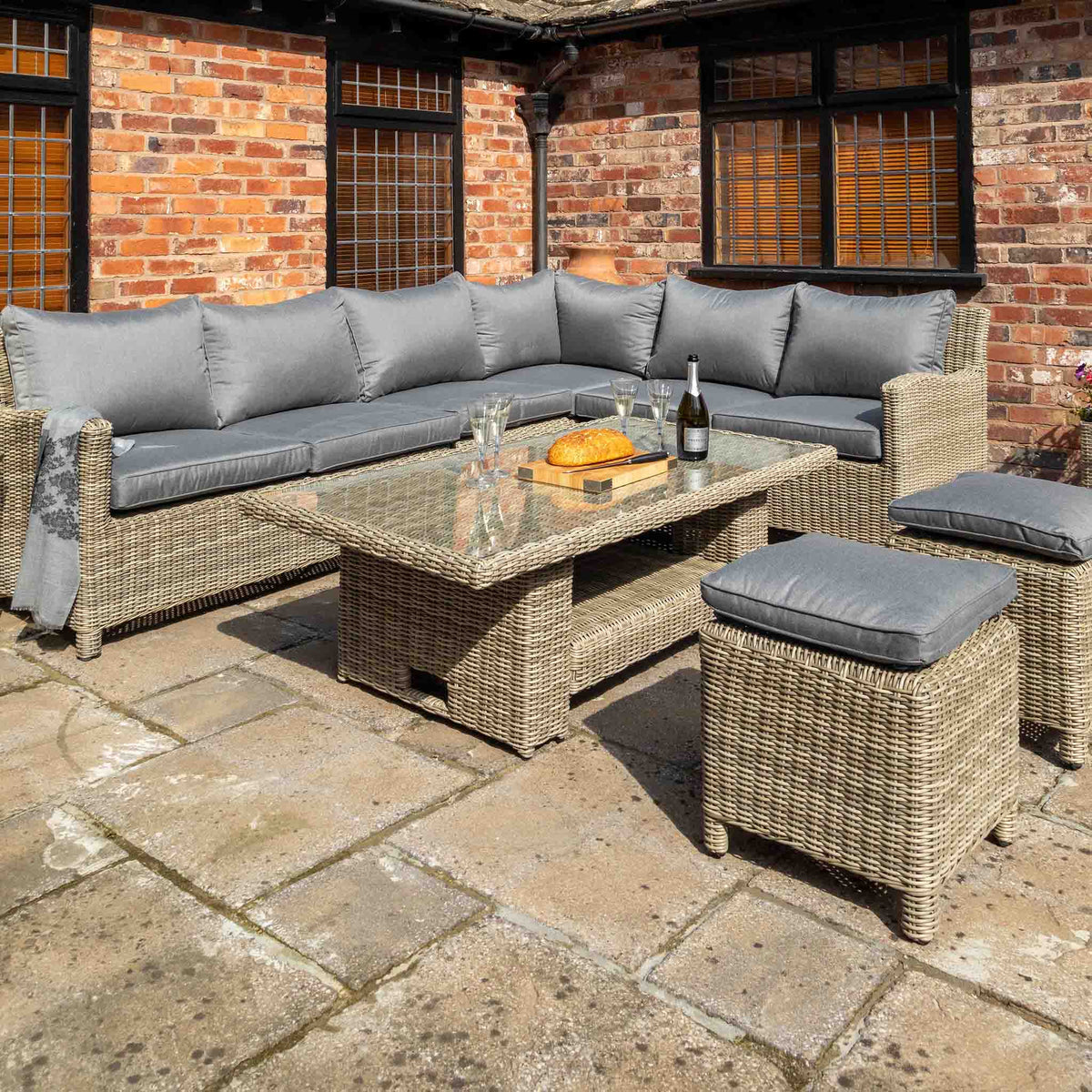 Wentworth Deluxe Rattan Corner Sofa Garden Lounge Set with Adjustable Table - Lifestyle