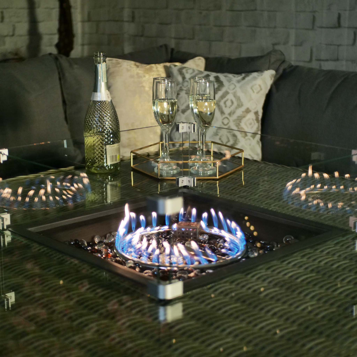 Wentworth Rattan 120cm Fire Pit Garden Dining Table & Lounge Set close up of flame