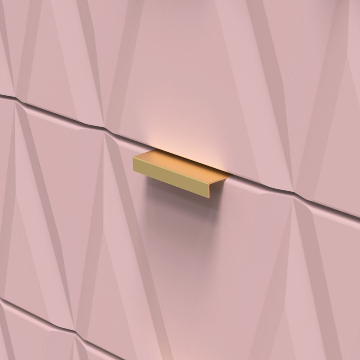 A gold-colored shelf is affixed to a textured pink wall, creating a shadow beneath it.