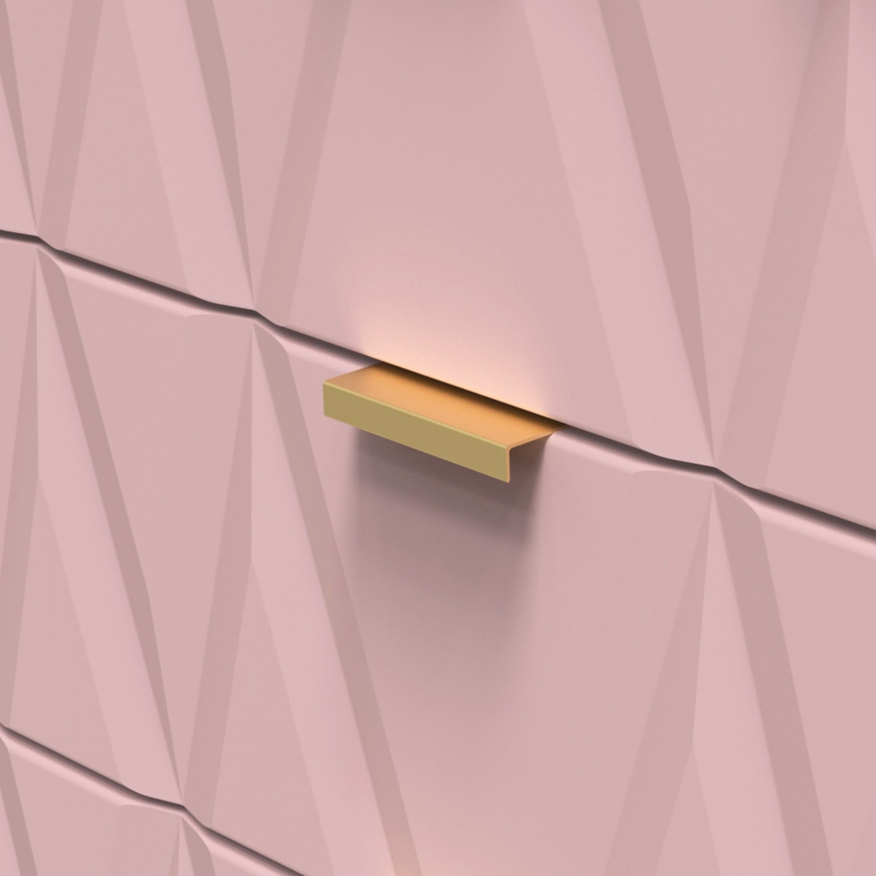 A gold-colored, rectangular drawer pull is mounted on a textured, pinkish wall with geometric patterns. There's a gentle light casting a soft shadow beneath the handle.
