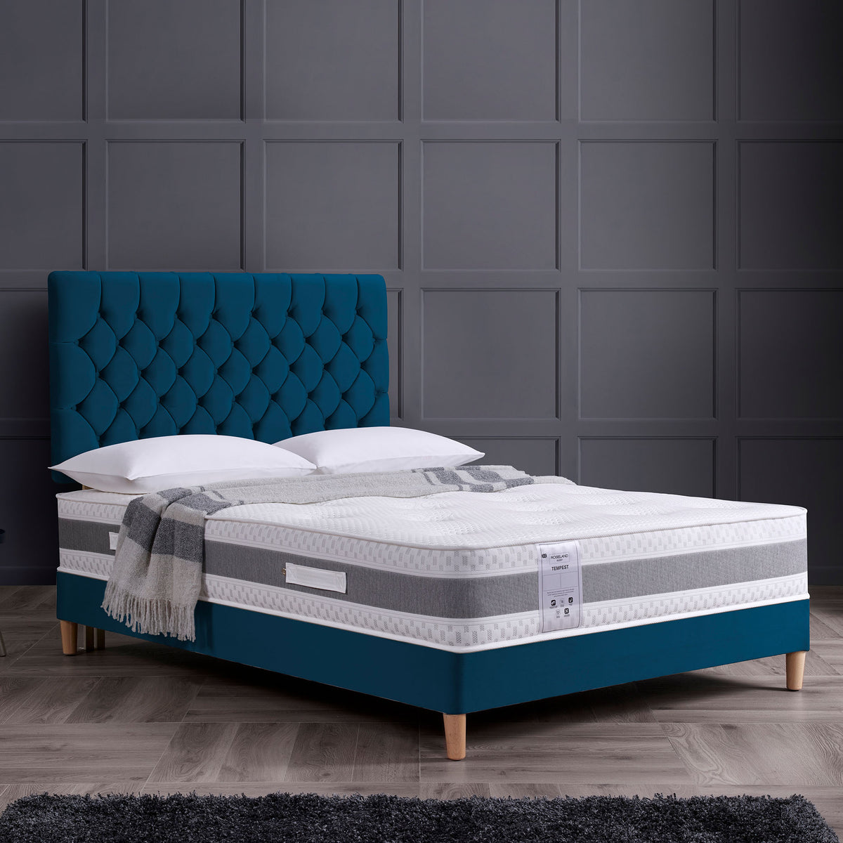 lifestyle image of the Roseland Sleep Tempest Memory Coil Mattress